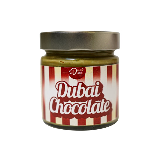 Jar of Dubai Chocolate spread with a red and white striped label and silver lid